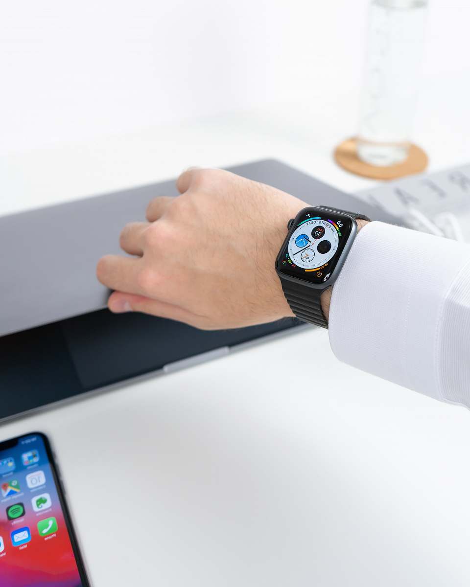 mobile phone person wearing Apple Watch cell phone